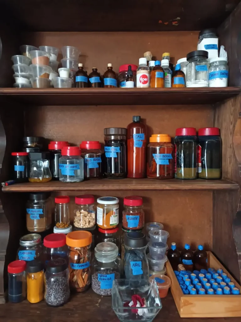 Shelfs with supplies to make natural dyes by Mildred & Sama of Suula