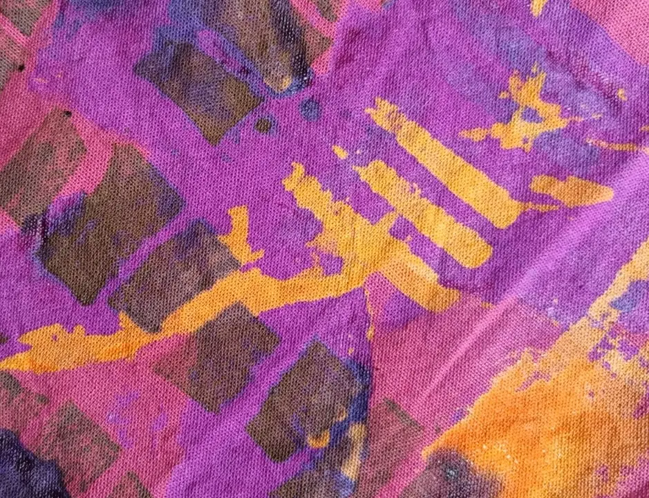 Dyed fabric in purples and gold by Mildred & Sama of Suula
