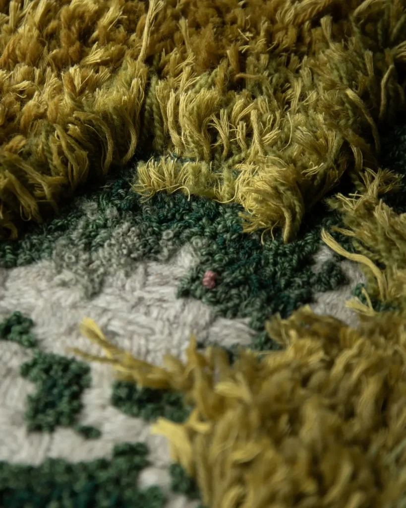 Close up of visible mending by Minttu Wikberg