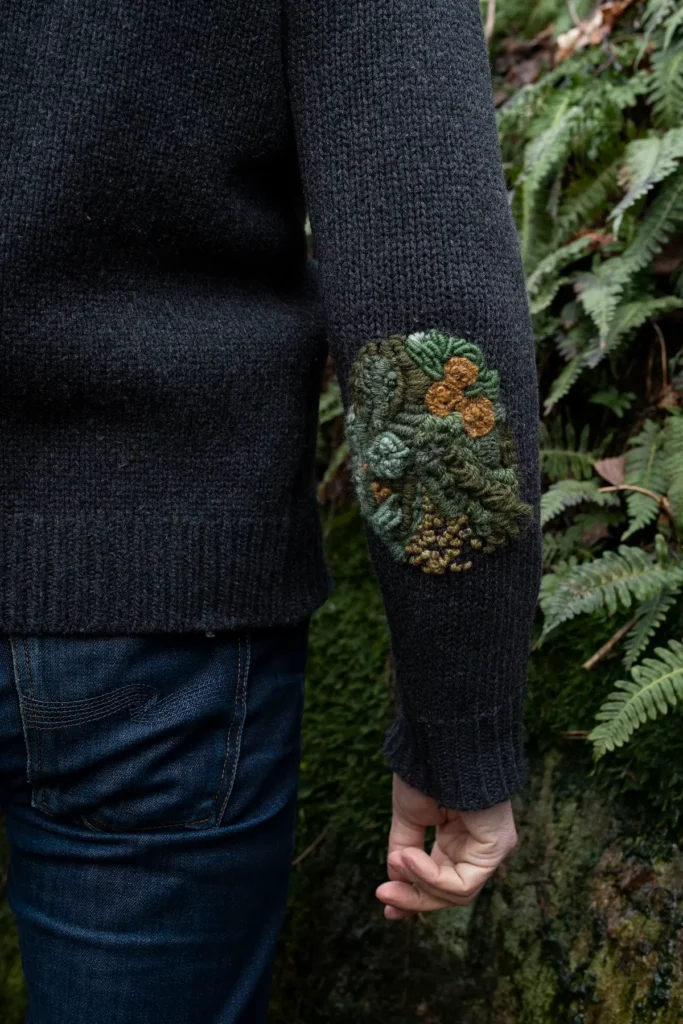 Mended elbow on a sweater by Minttu Wikberg