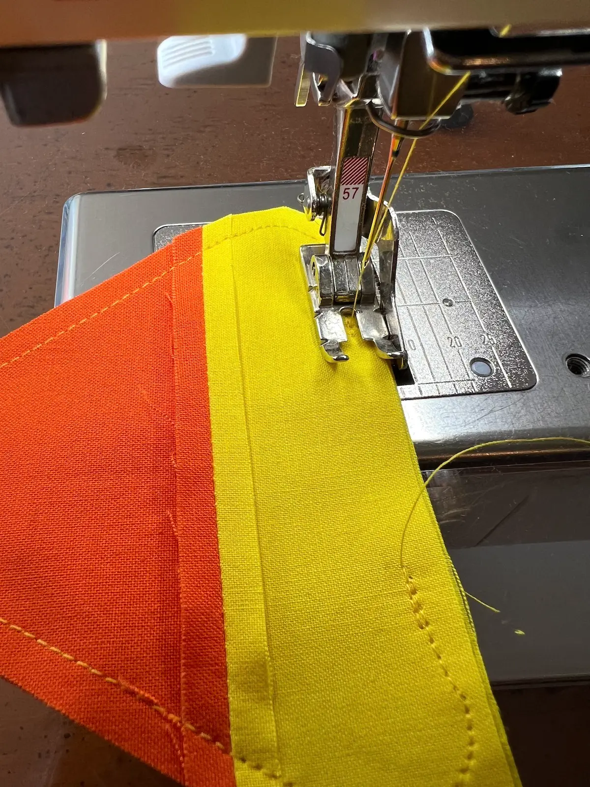 Stop about 1-inch away from the second yellow corner leaving an opening to fill the candy corn