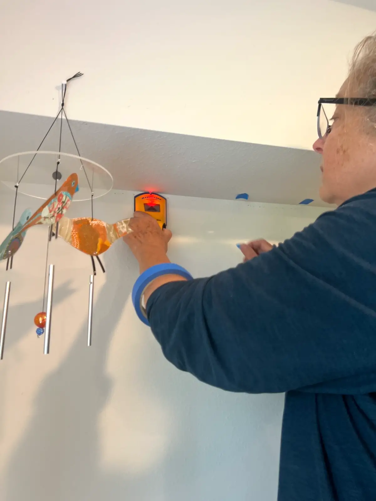 Using the stud finder to find the next stud