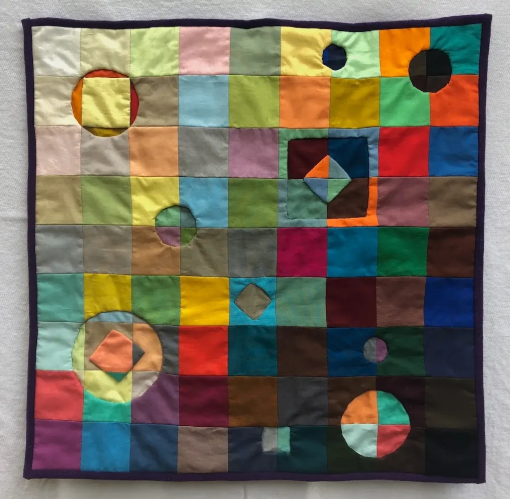 World Turned Upside Down fiber art by Ann Wasserman