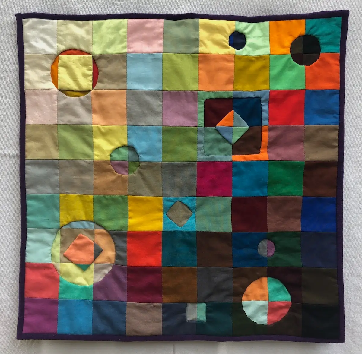 World Turned Upside Down fiber art by Ann Wasserman