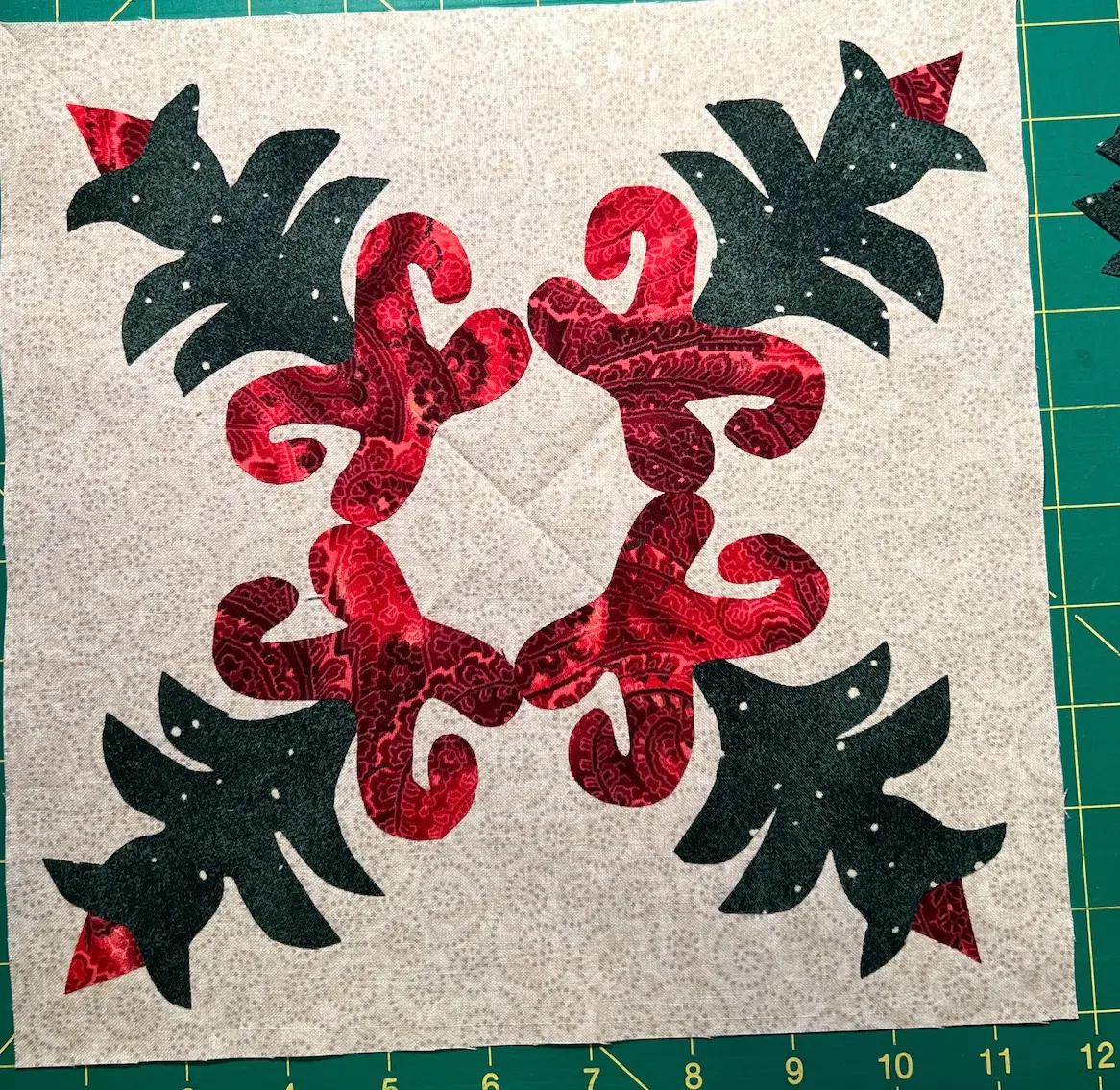 Press all of the Christmas Cactus elements to the background fabric