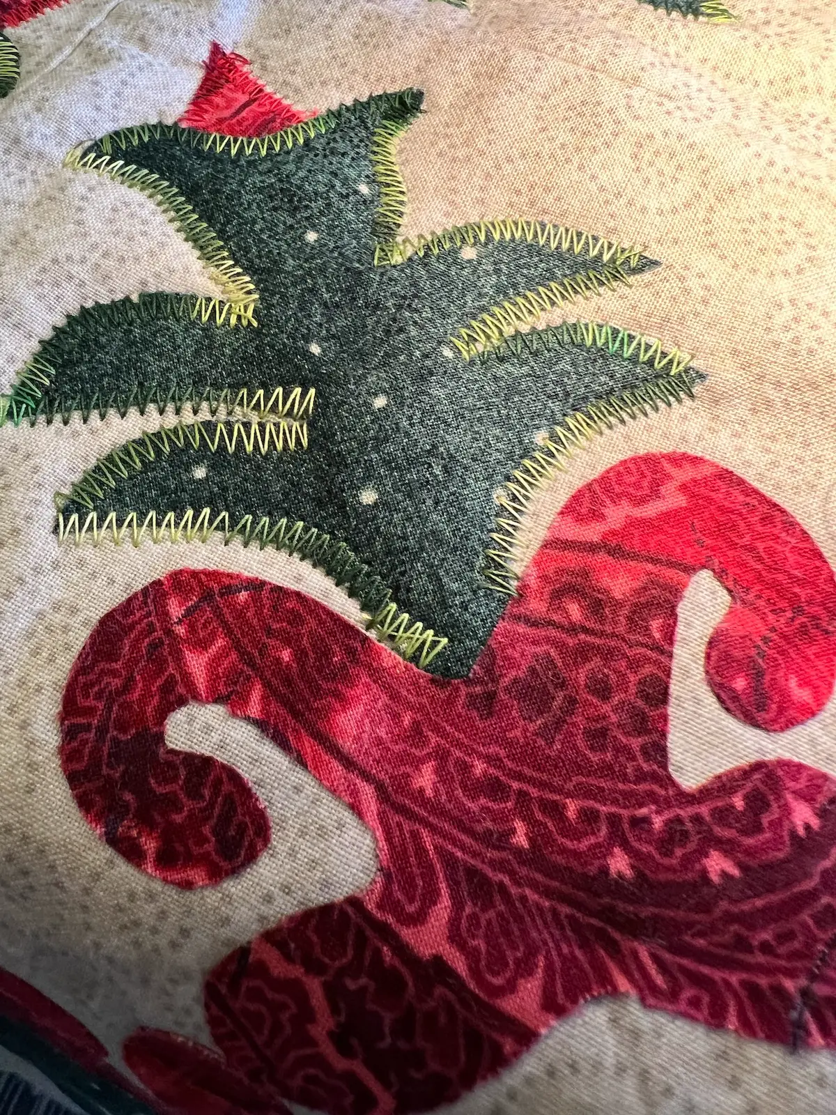 Green stitching complete on the Christmas Cactus. See how the stitching covers the bud tucked into the stem?