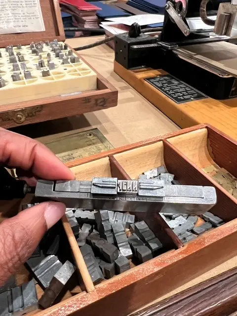 Jenn Graves showing a type for printing