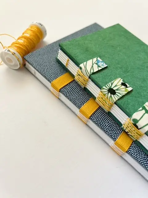 Jenn Graves two hand bound books she made
