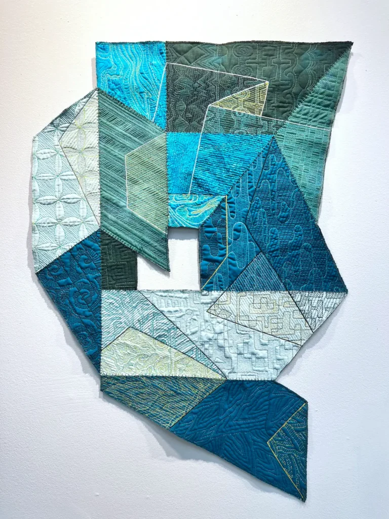 Unfolding Turquoise art quilt designed and made by Lauri Jones