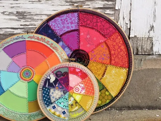 Color wheels hand embroidered by Nichole Vogelsinger
