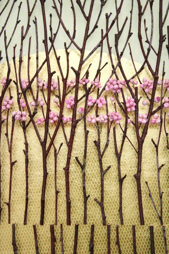 Close up of the layered tulle, twigs and flowers by Olga Prinku