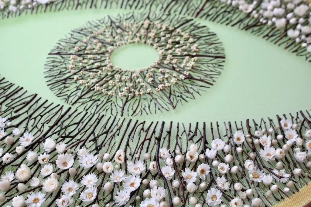 Another view of work in progress on eye on the green tulle by Olga Prinku