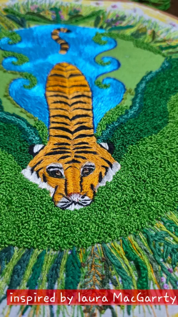 Tiger in a river embroidery by Radhika Vyas