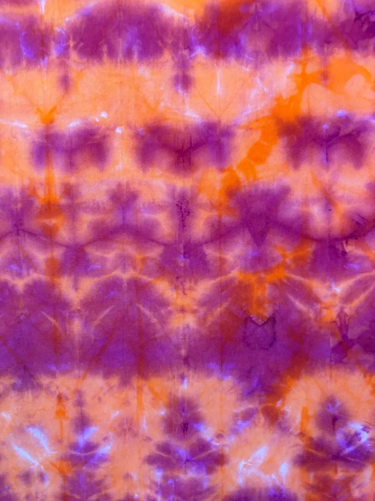 Art cloth fabric in orange and purple by Sonja Lee-Austin