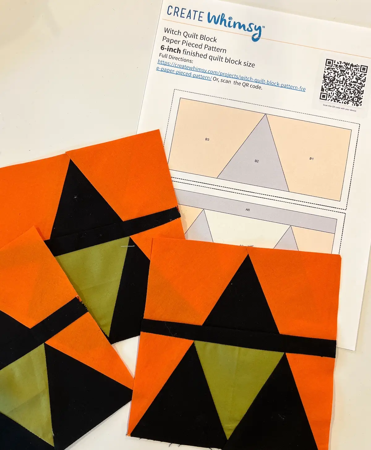 Finished blocks with the pattern for the Witch quilt block