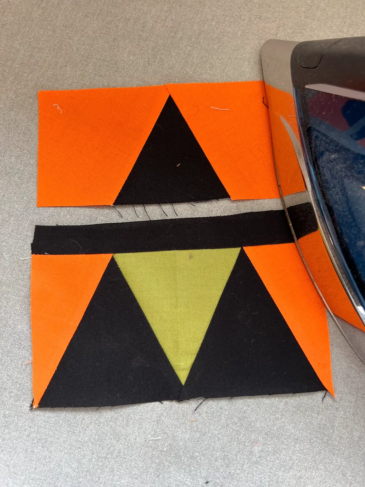 Two patches complete and give them a good press for the Witch quilt block