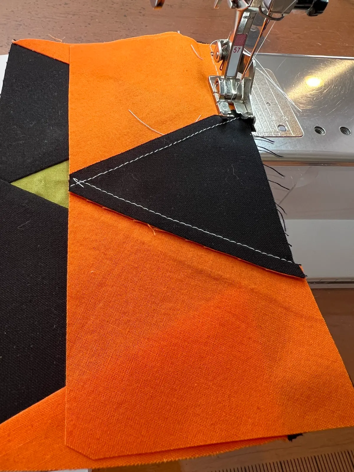 Sew the two patches together to complete the Witch quilt block