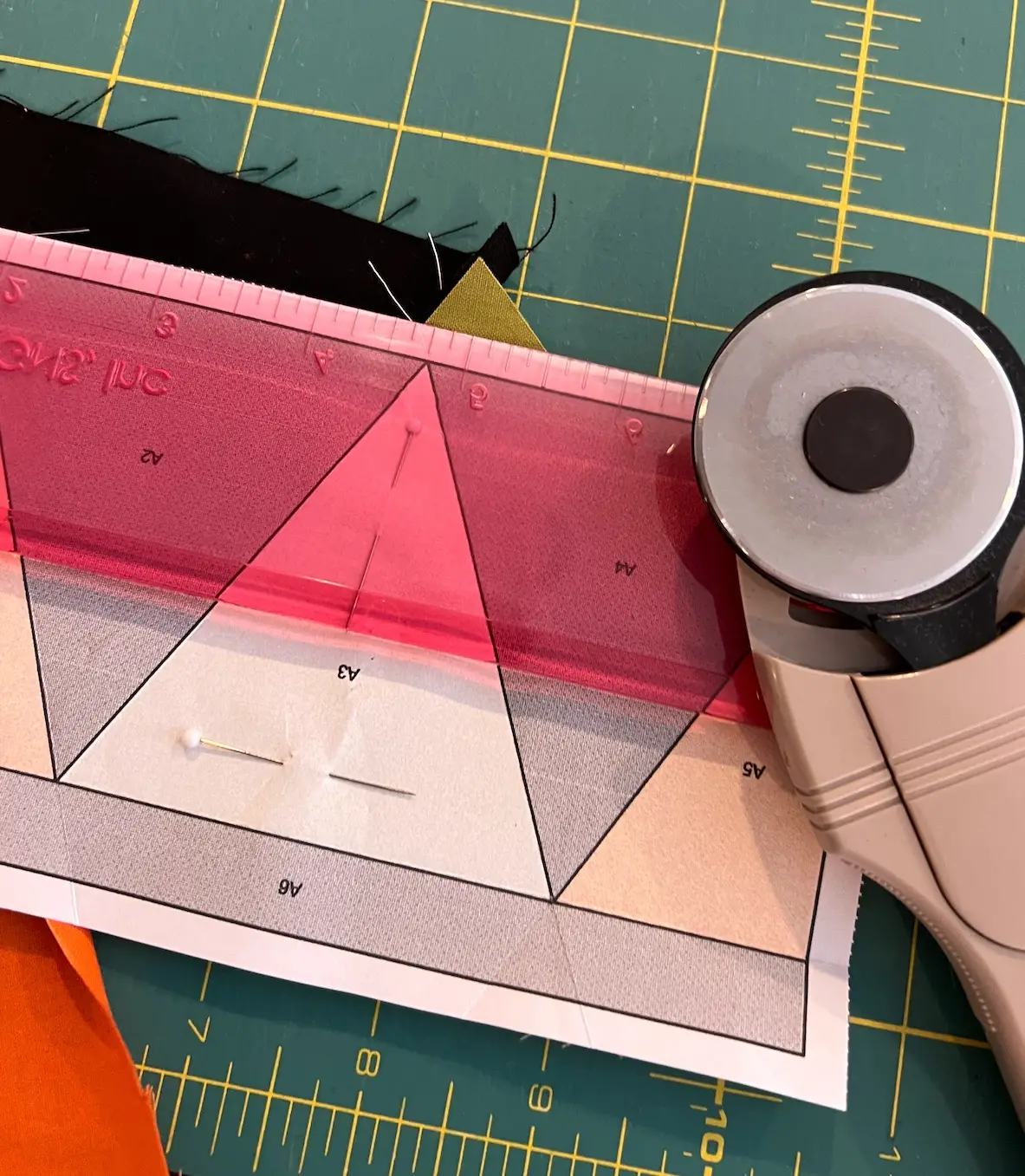 Trim the outside edge of the patch for the Witch quilt block