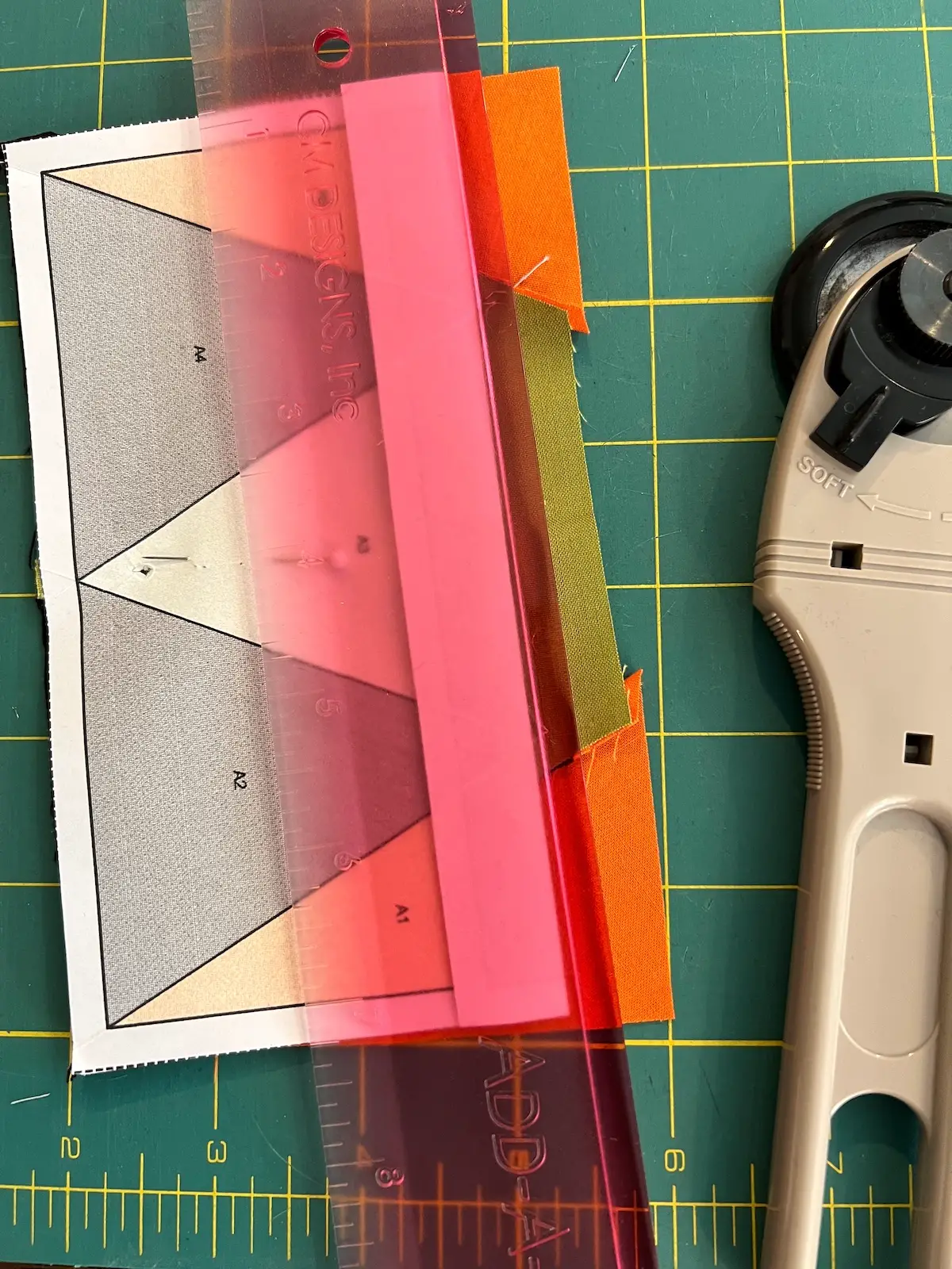 Fold back the pattern for the hat brim and trim to 1/4 inch for the Witch quilt block