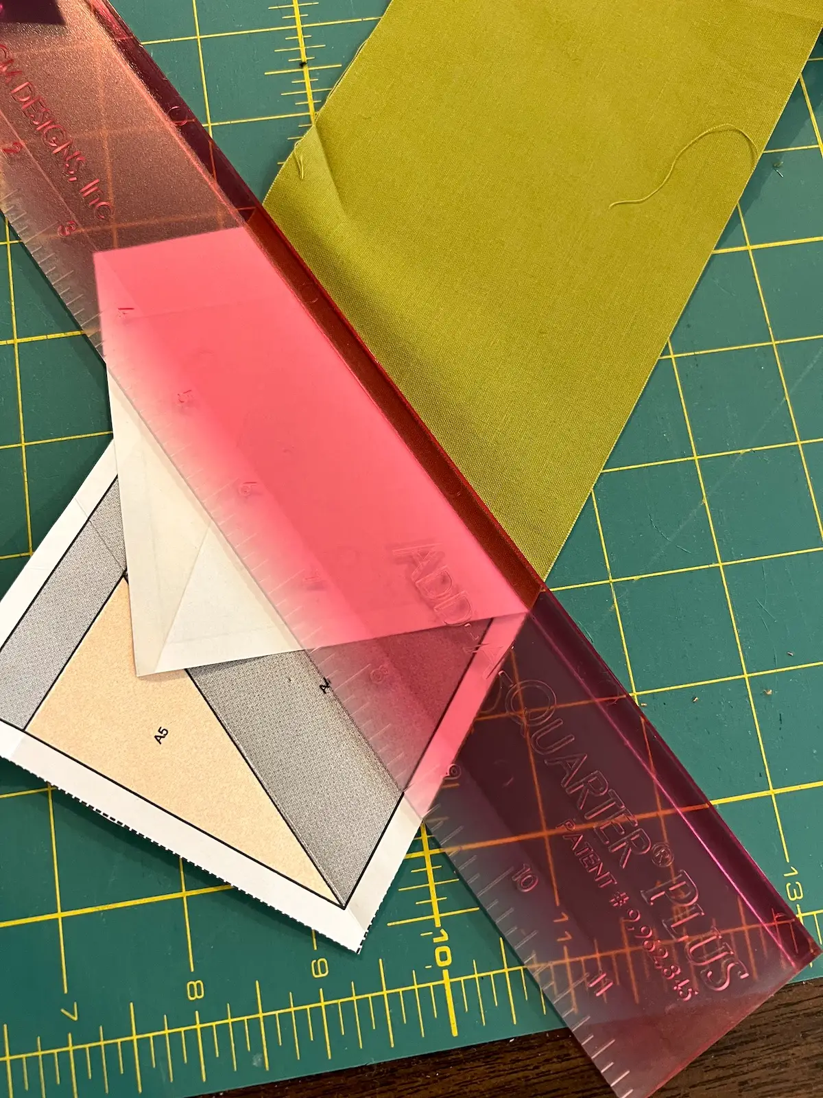 Trim the fabric to 1/4 inch seam allowance for the Witch quilt block