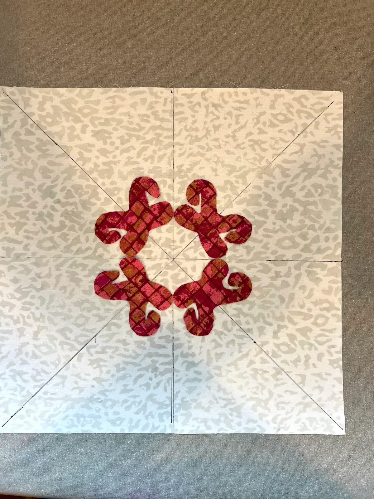 Christmas Cactus quilt block base of the cactus laid onto the background fabric