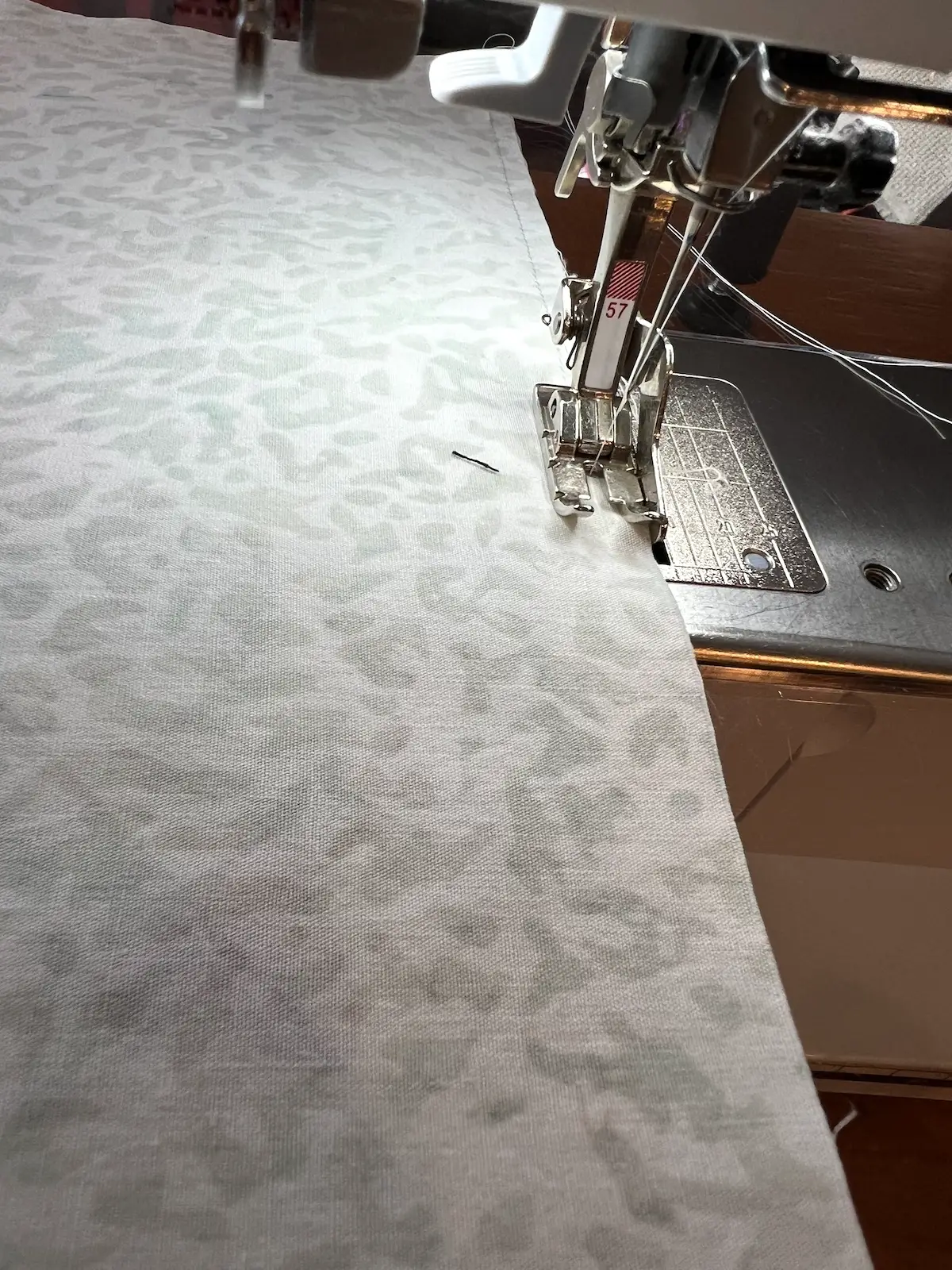 Christmas Cactus quilt block stitching the blocks together