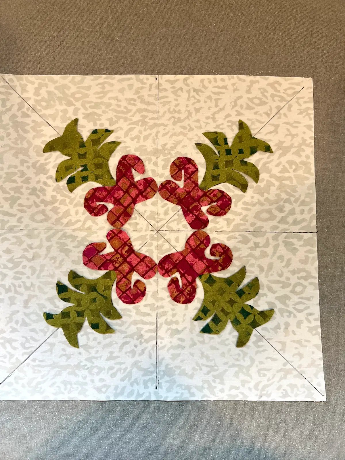 Christmas Cactus quilt block stems placed on the base of the plant