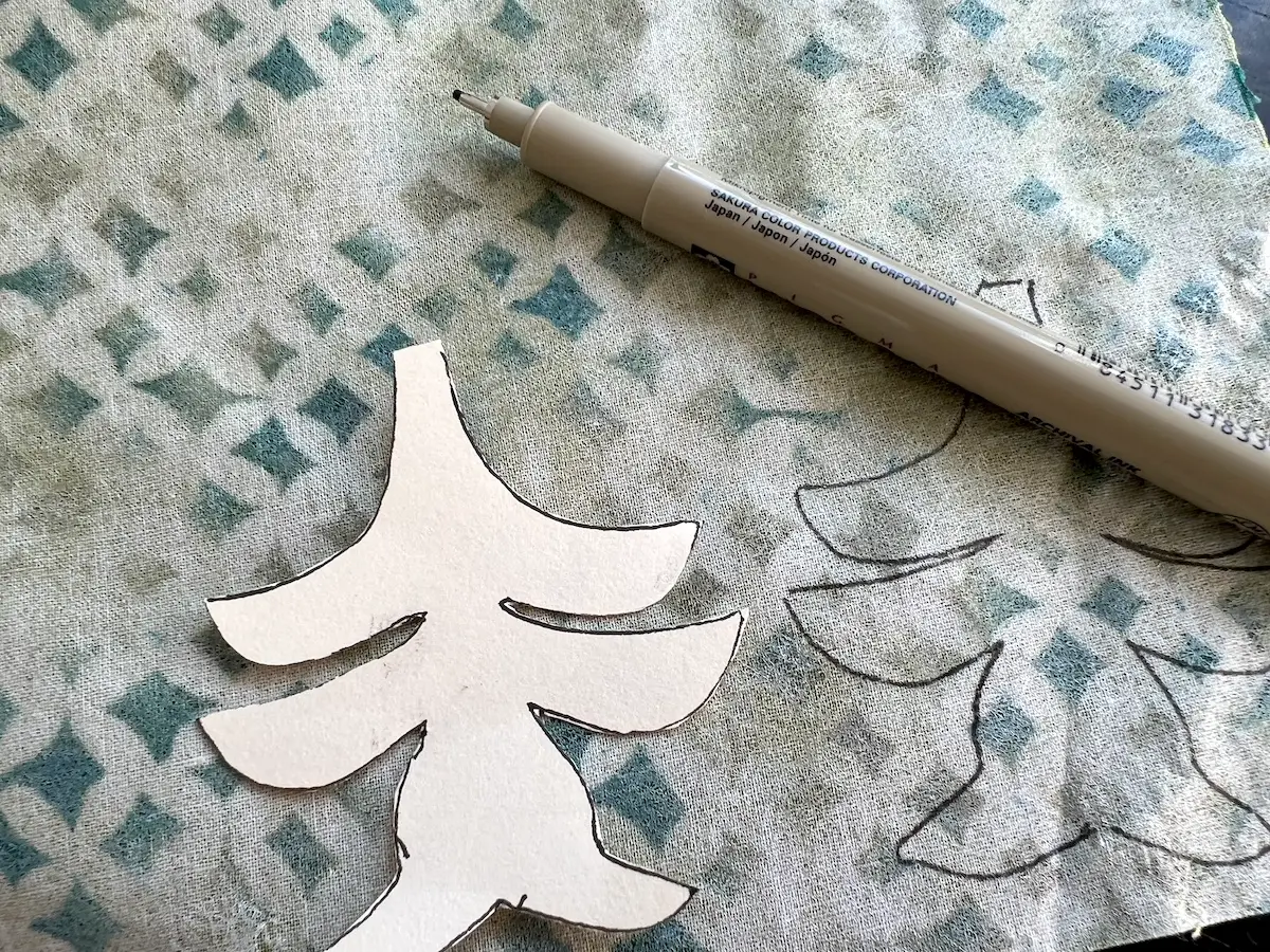 Trace around the template onto the back of the prefused fabric for the Christmas Cactus quilt block