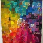 Colorful scrap quilt by Jennifer Strauser