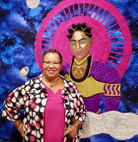 Renée Fleuranges-Valdes with one of her quilts