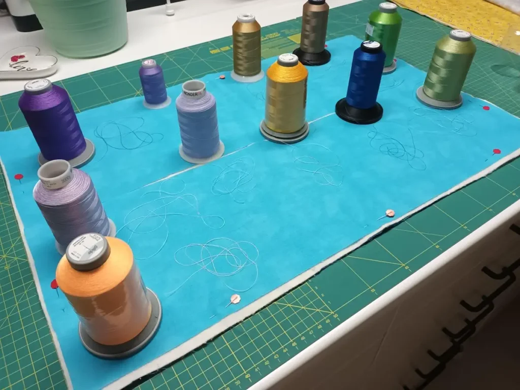 Choosing threads to quilt Remember ME by Simone Steuxner