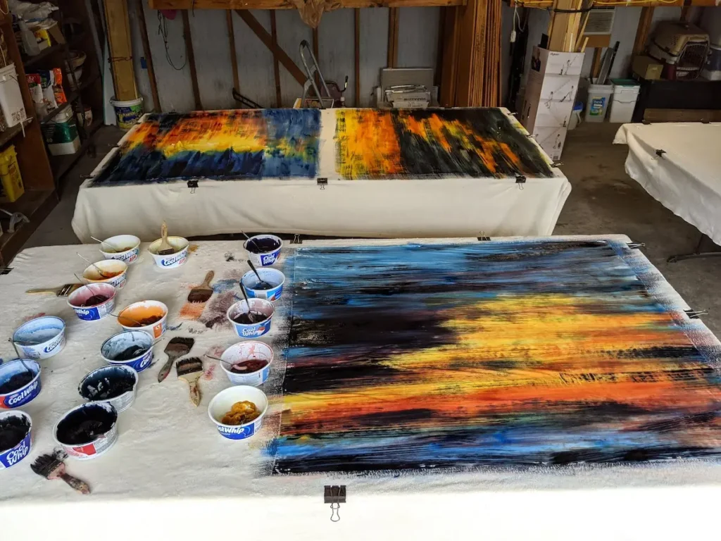 Painting fabric in Brenda Schloesser garage work space