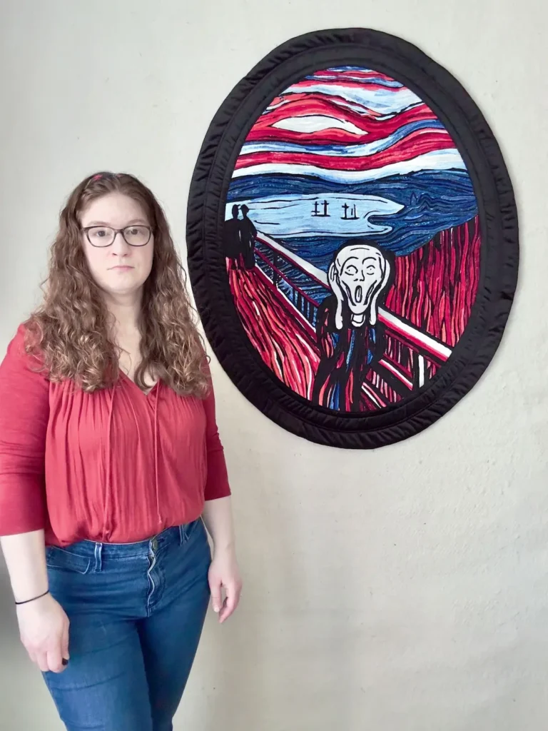 Eva Saunders and her quilt American Scream