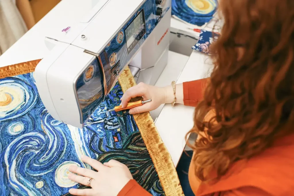 Eva Saunders quilting Starry Night quilt