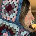 Bry with a side view of granny square balaclava