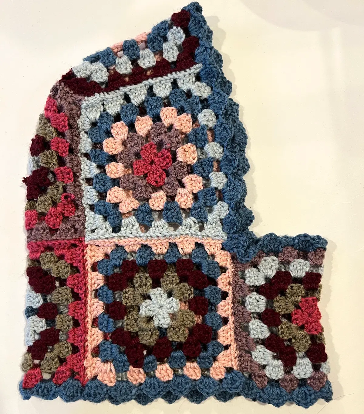 Another side view of the pink and blue granny square balaclava