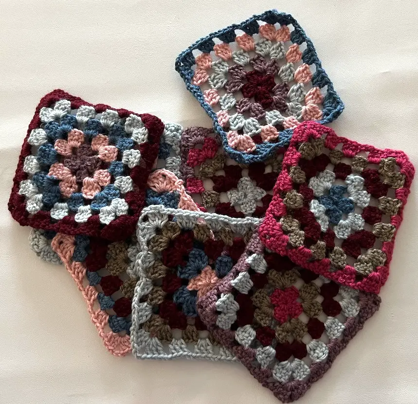 Eight granny squares ready to be made into a balaclava