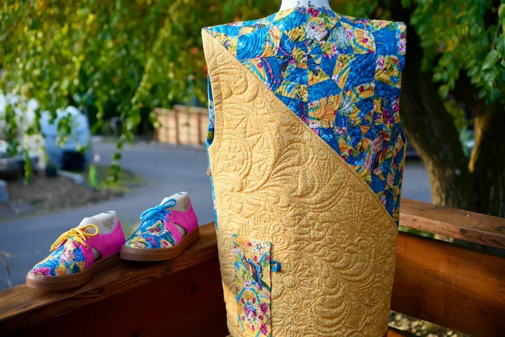 Yellow quilt vest with shoes by Kimberly Bennefield
