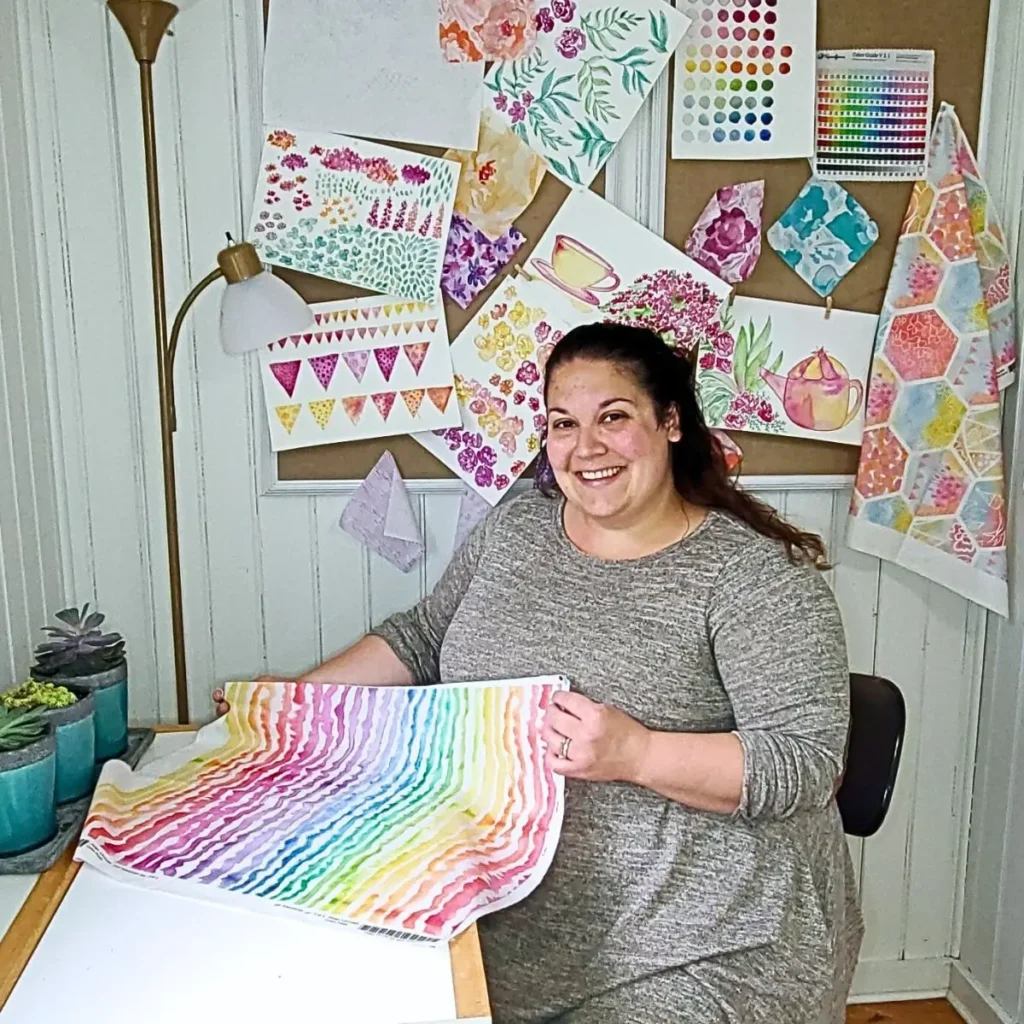 Lauren Weber with a fabric design she made