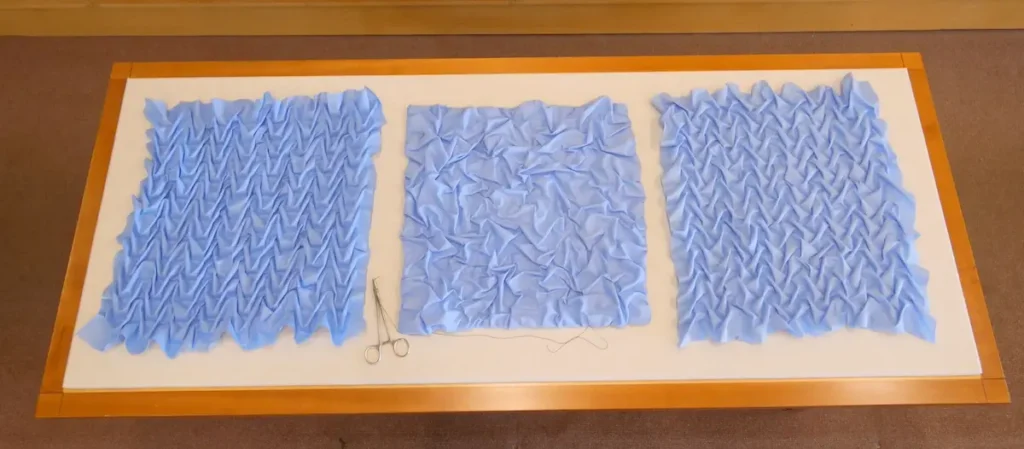 Sutured fiber art by Ruth Tabancay