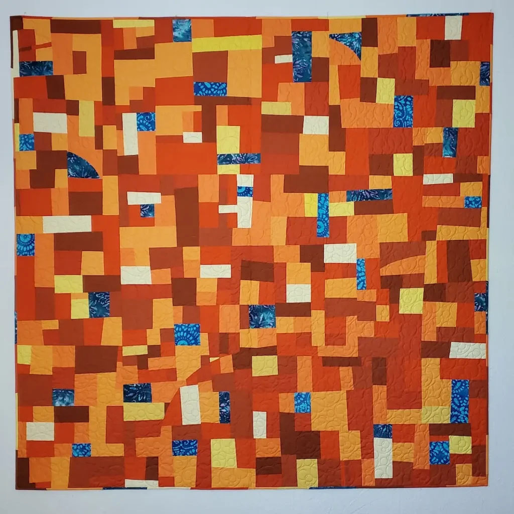 Orange Juice Blues quilt by Angee Turner