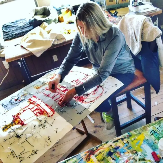 Irmgard Geul working on a piece in her studio
