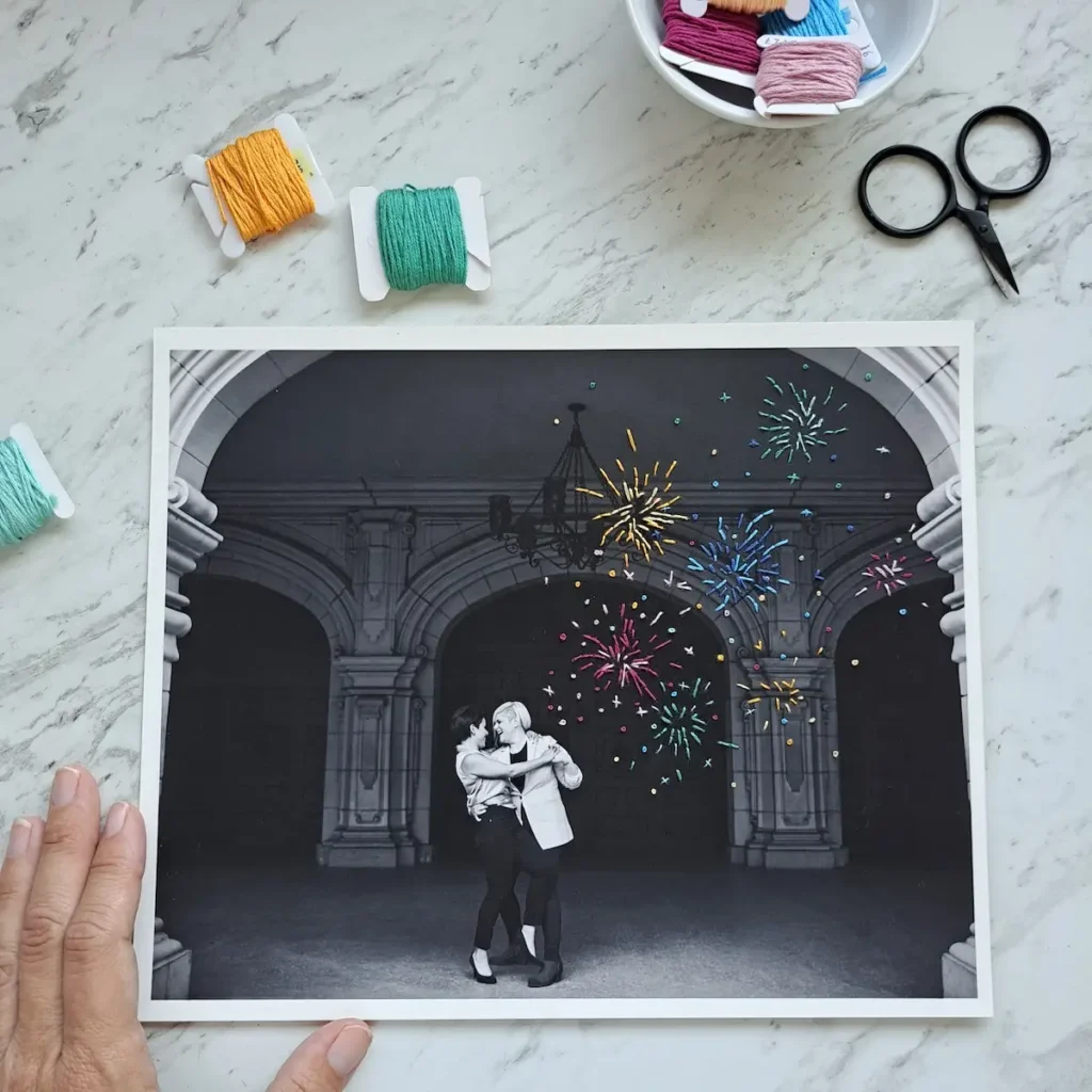 Fireworks embroidery on a picture of a couple dancing by Katia Herrera