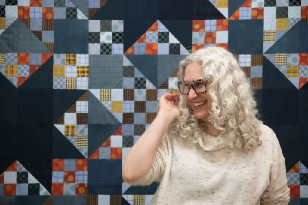 Michelle Freedman with her Juna Star quilt