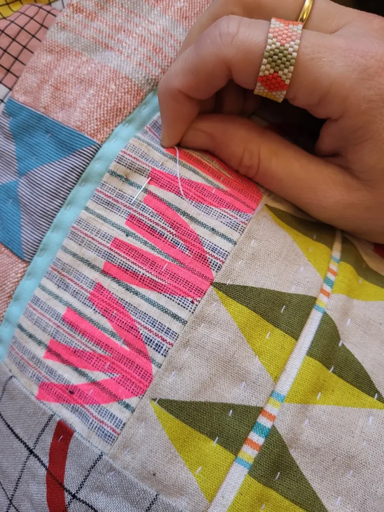 Hand quilting in progress by Miesje Chafer