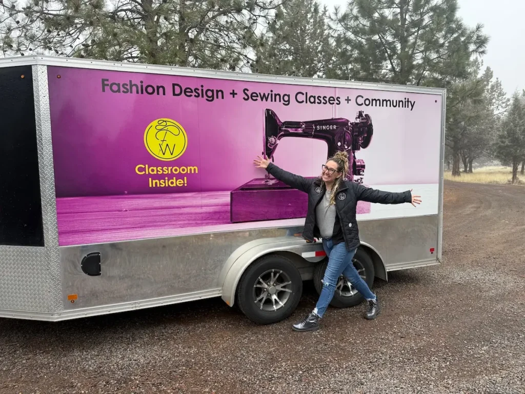 Qristy Kurtz with her new wrapped trailer for Fashion Workshop