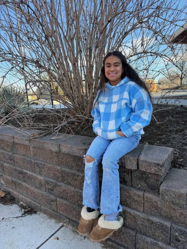 A student of Qristy Kurtz in her finished hoodie