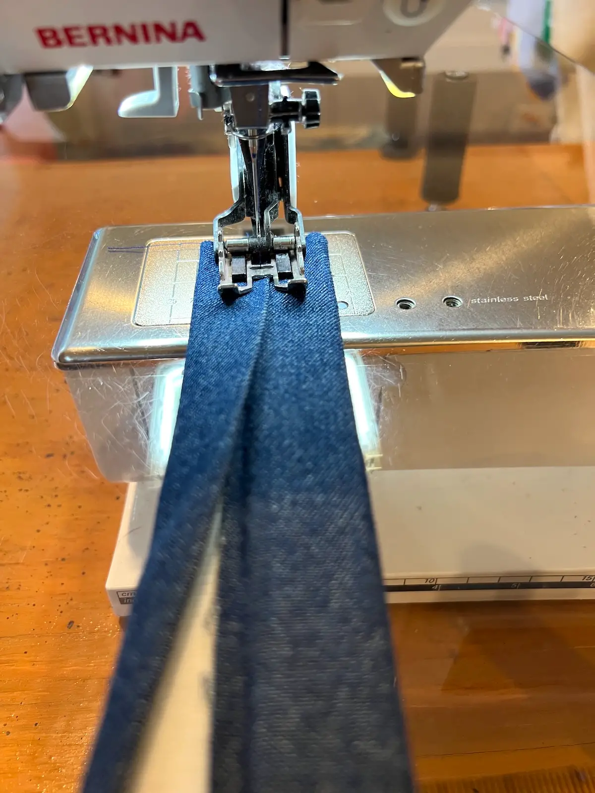 Blue patchwork bag fold the folded edge around and topstitch