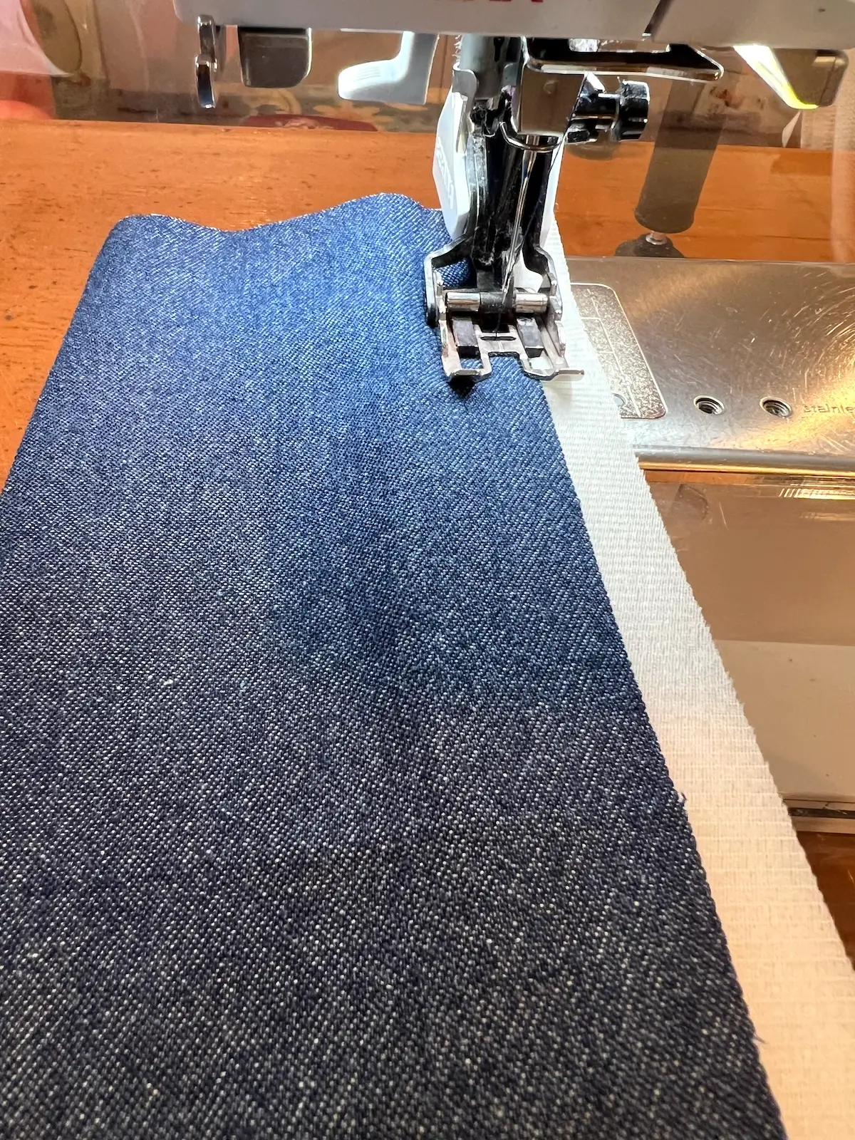 Blue patchwork bag sew the raw edge with wrong side to the foam
