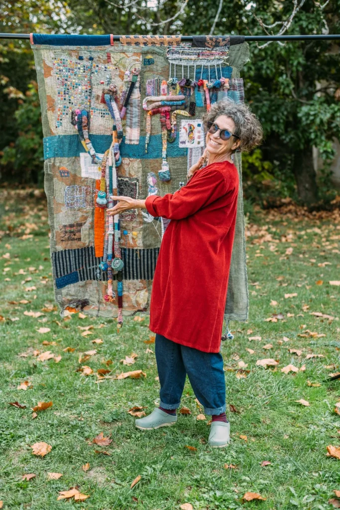 Debby Weiss with one of her pieces outside